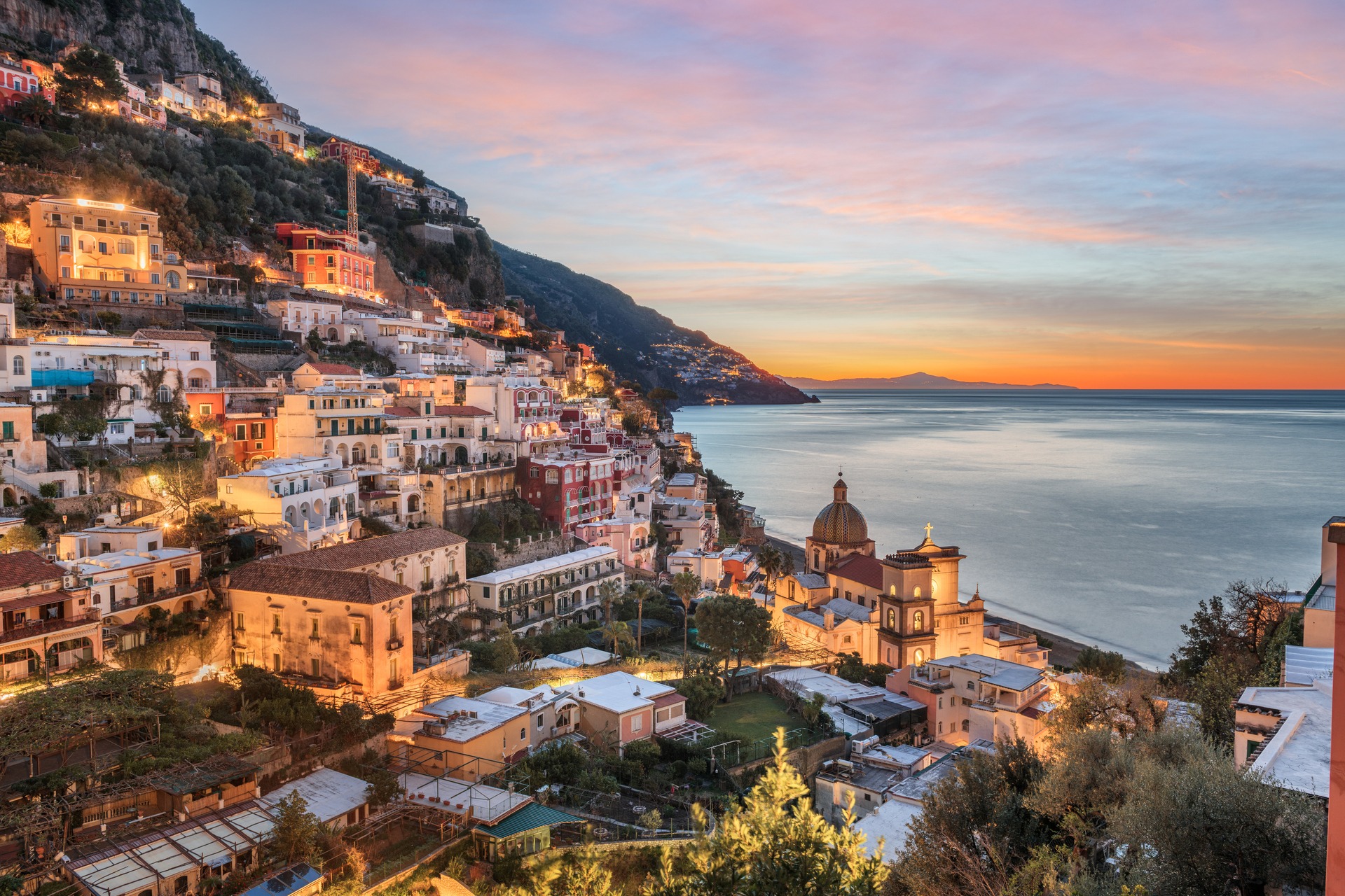Sunset view of Positano village on the Amalfi Coast, Italy