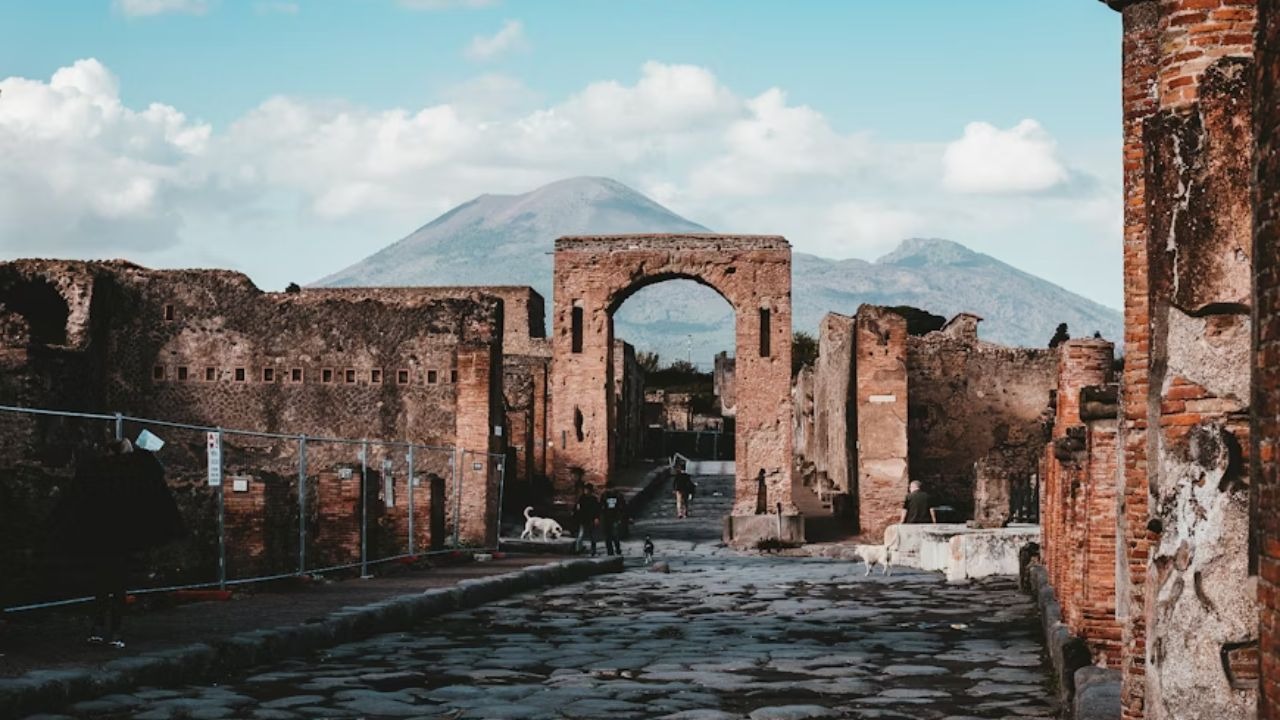 Ruins of ancient Pompeii with Mount Vesuvius in the background