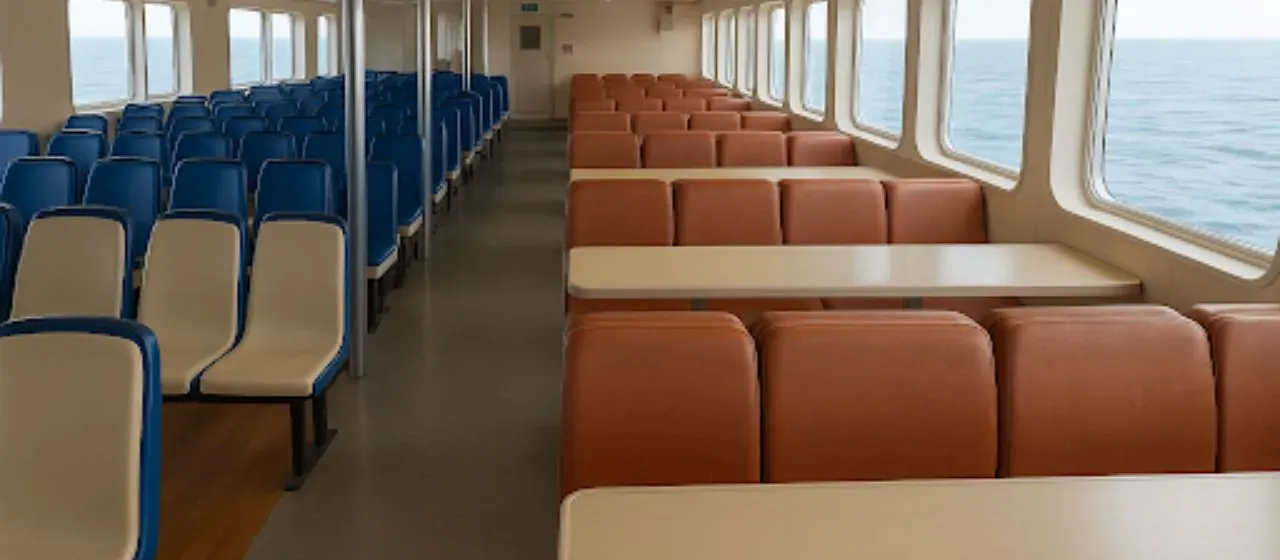 Interior seating of Amalfi Coast ferry overlooking the sea